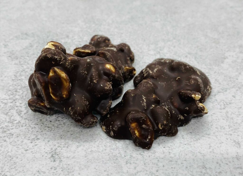 arašídy v čokoládě NUTSMAN
